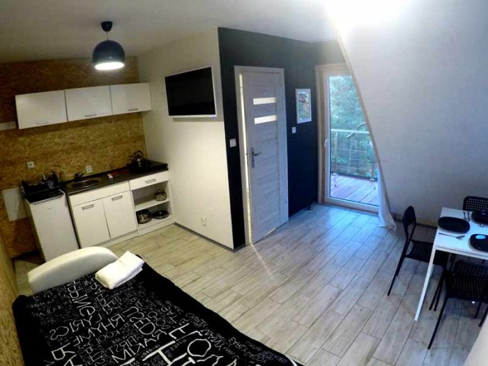 Apartament czteroosobowy z dużym tarasem i oddzielną sypialnią