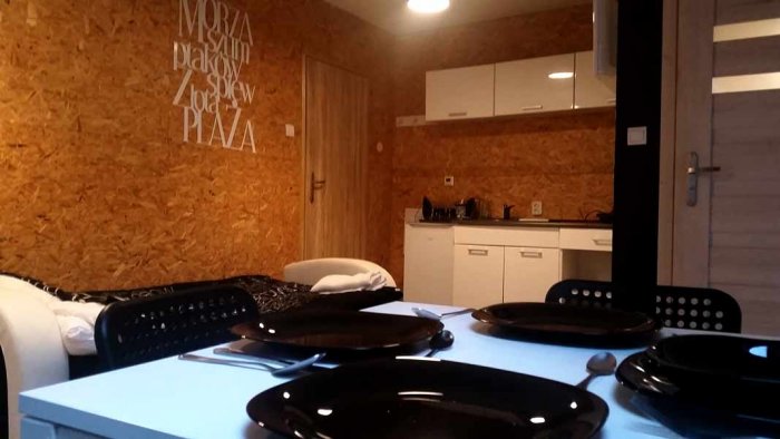 Apartament czteroosobowy z dużym tarasem i oddzielną sypialnią