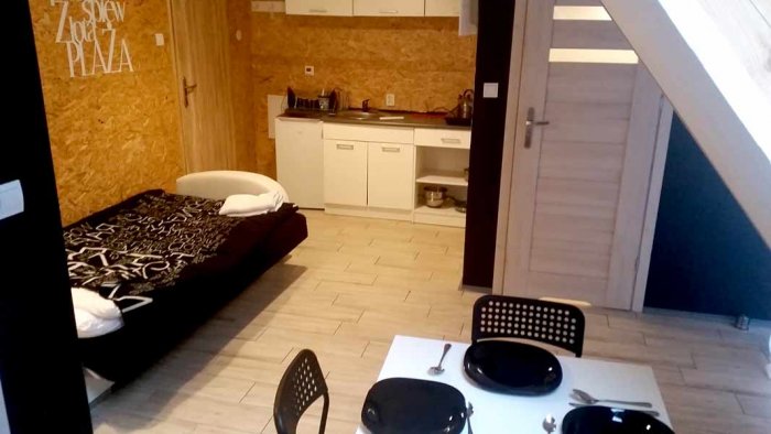 Apartament czteroosobowy z dużym tarasem i oddzielną sypialnią