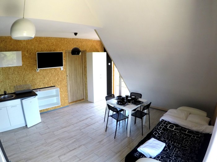 Apartament czteroosobowy z dużym tarasem i oddzielną sypialnią