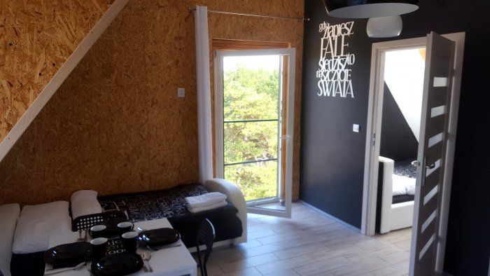 Apartament czteroosobowy z dużym tarasem i oddzielną sypialnią