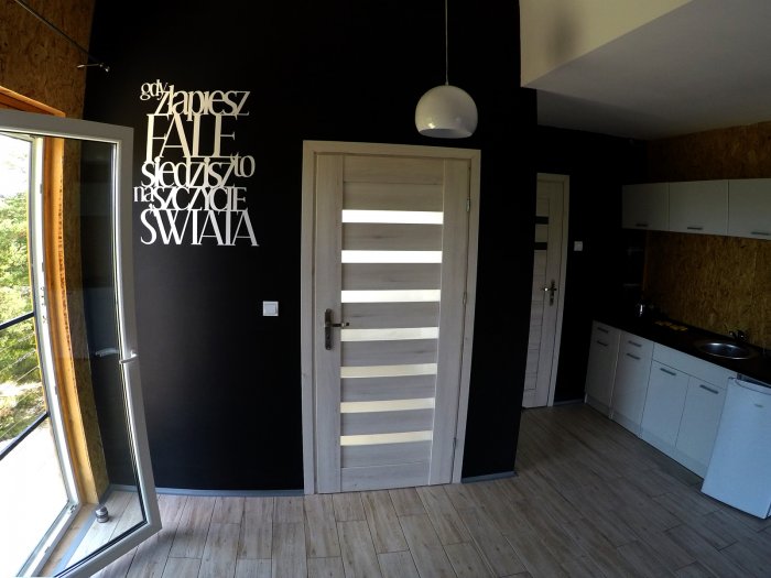 Apartament czteroosobowy z dużym tarasem i oddzielną sypialnią