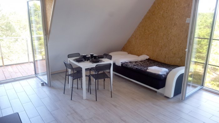 Apartament czteroosobowy z dużym tarasem i oddzielną sypialnią